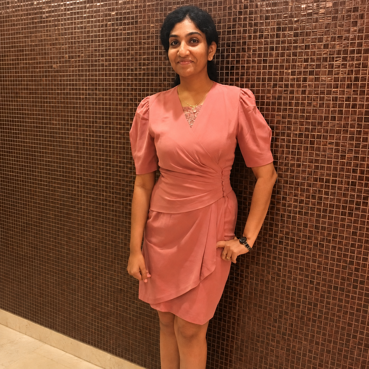 Bhargavi in a pink dress